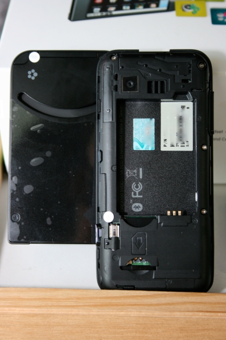Battery cover removed. No RESET button.